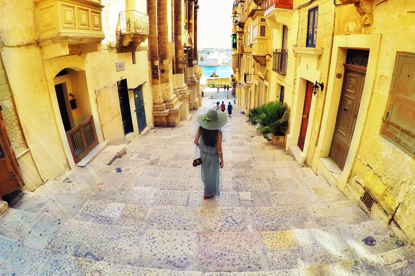 woman-traveler-walking-in-malta-island-city-cente-2023-11-27-05-34-06-utc